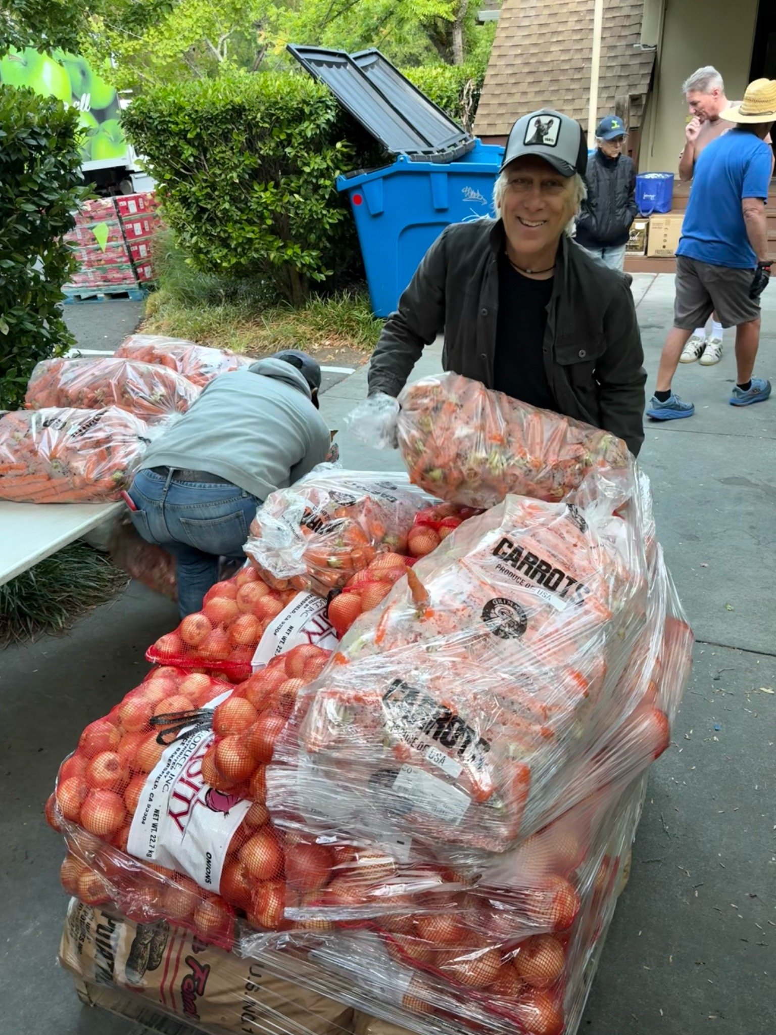 Larry Bragman helping move food at the Fairfax Food Pantry